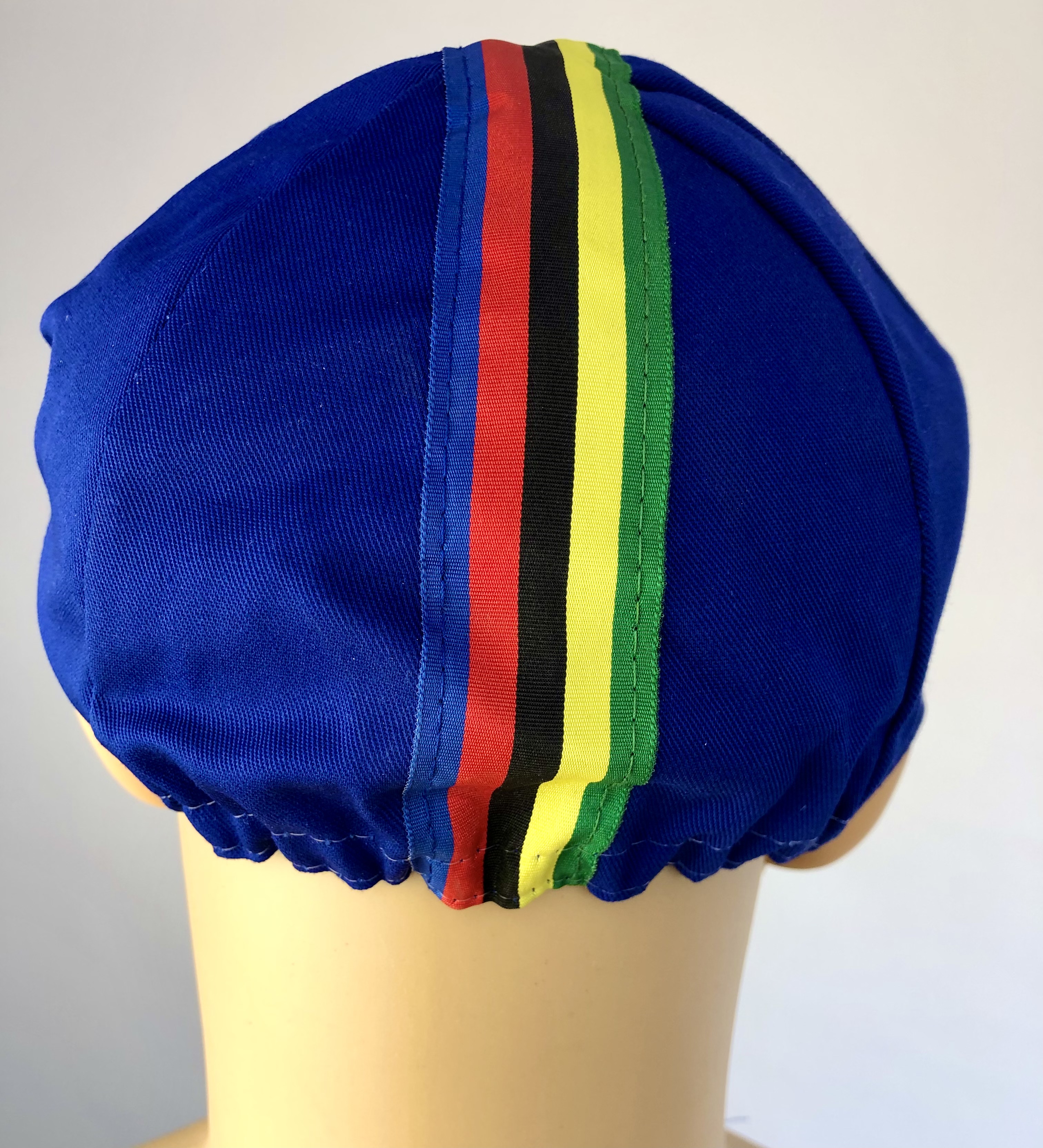 Rennradkappe_Historical_team_cap_retro_cycling_cap_radmutze_Rennkappe_Cycling_-Radlercap_La-Casquette_fahrradkulturin_-blau-mit-bunten-Streifen2